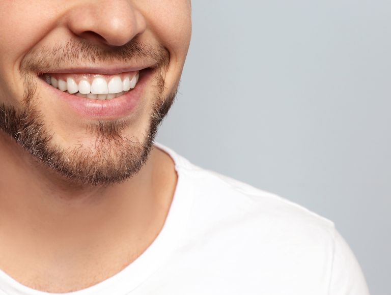 Young man with beautiful smile